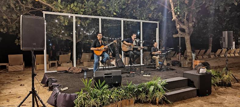 a band playing on a stage at Prama Beach Resort in Sanur