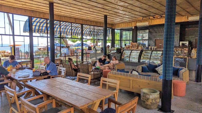people enjoying breakfast at the Byrd House on Sanur beach in Bali