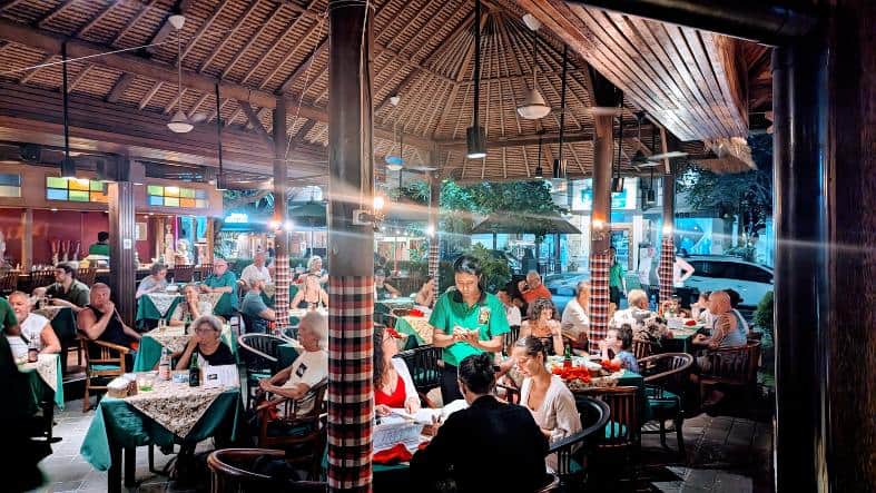 a restaurant in Sanur filled with people of all ages