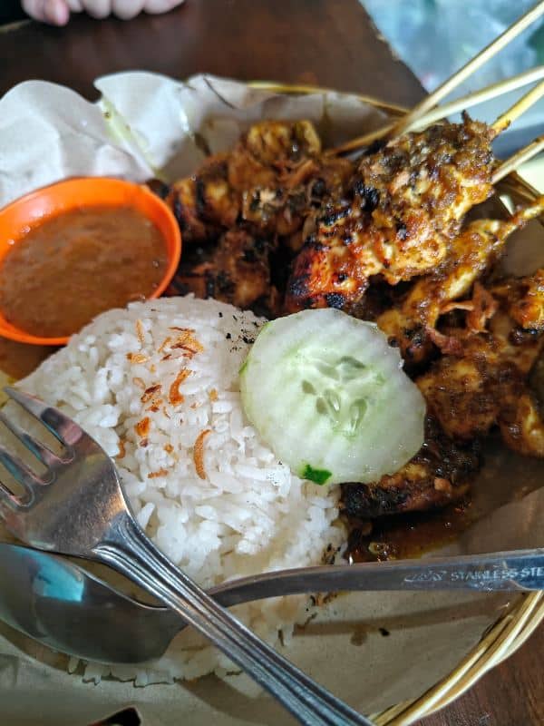 a traditional chicken satay from warung rainbow in sanur
