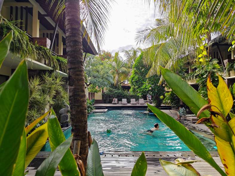 the pool area ta Arena Living hotel in Sanur