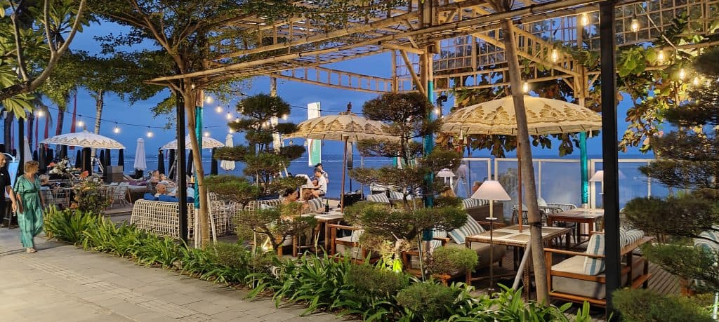 The Starfish lounge a restaurant with tables and chairs under a canopy