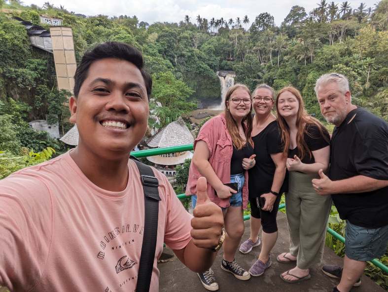 Bali Driver Putu from Bali Travel Times at a waterfall in Bali