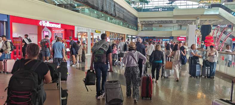 people who have arrived in Bali trying to get out of the airport