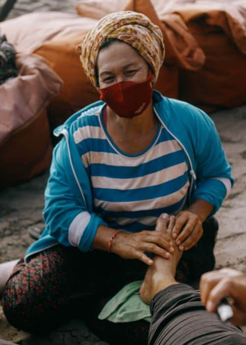 Getting a foot massage at Sanur Beach
