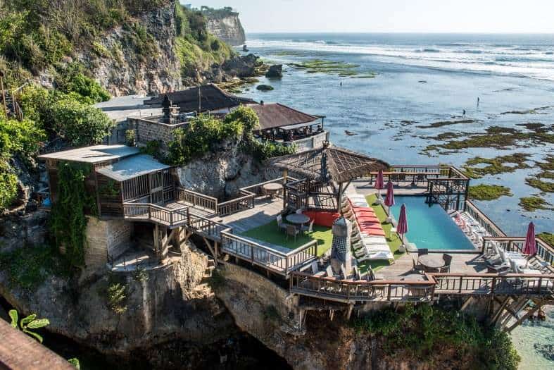 A beach club on a cliff overlooking the water in Uluwatu